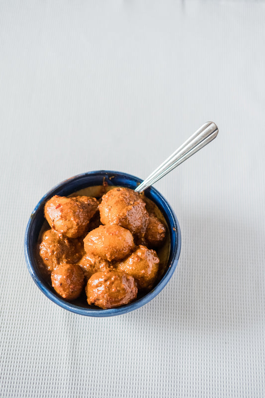 Potatoes in a hot red sauce (Lai Batata)